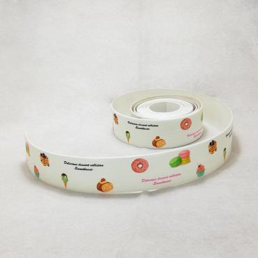 1--Anti-bacterial and water-proof tape - white embossed with candy shapes - width 3 cm - length 3.8 meters Brand: Generic